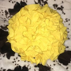Bright yellow decorative pillow
